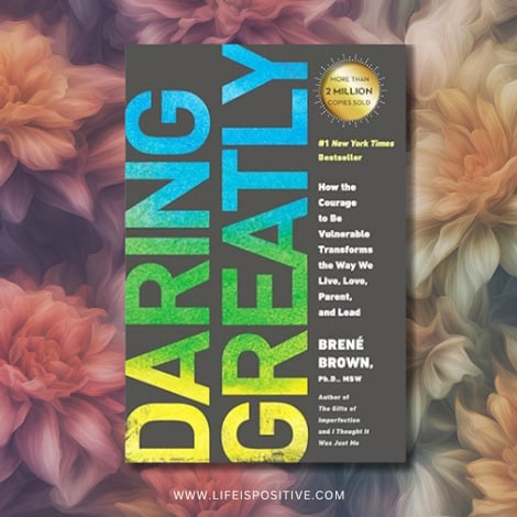 The book cover of "Daring Greatly" by Brené Brown features the title in striking gradient letters from blue to green against a dark, floral-patterned background. A gold badge boasts "More than 2 million copies sold." Visit www.lifeispositive.com for more on daring-greatly-book-by-brene-brown.