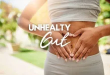 A person pinching waist fat with the text "10 signs of an unhealthy gut" indicating concerns about diet and digestive health.