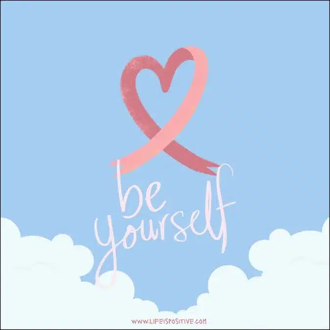 A breast cancer awareness symbol with the words 'be yourself' written on it, promoting individuality and self-love.