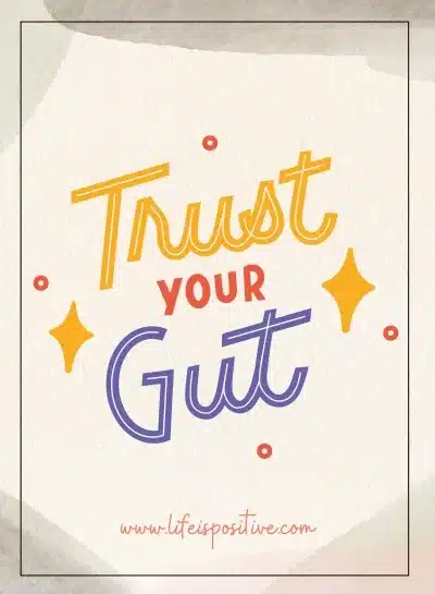 Motivational quote on a speckled background, encouraging self-confidence with the phrase 'trust your gut instinct' in colorful, playful lettering.