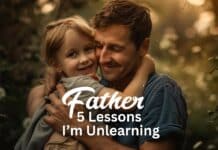 A father lovingly embraces his smiling young daughter in a serene, sunlit outdoor setting. The text overlay reads, "From My Father: 5 Lessons I’m Unlearning." The scene conveys warmth, connection, and reflection.