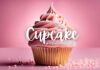 A vanilla cupcake with pink frosting takes center stage against a pink background, with the words "Cupcake Personality" written in elegant white cursive. Pink and white sprinkles are delicately scattered around, adding the perfect touch to this whimsical scene.