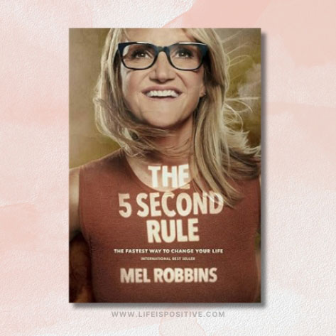 Cover of "The 5 Second Rule" by Mel Robbins. Features a smiling woman with glasses and wavy blonde hair against a brown background. The text reads, "The 5 Second Rule: The Fastest Way to Change Your Life." The website "www.lifeispositive.com" is at the bottom.