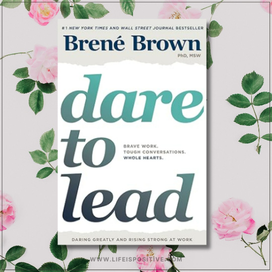 The image displays the cover of "Dare to Lead" by Brené Brown, featuring its distinctive teal title that boldly declares dare-to-lead-by-brene-brown. The subtitle reads "Brave Work. Tough Conversations. Whole Hearts." A backdrop of pink roses and green leaves adorns the white background.